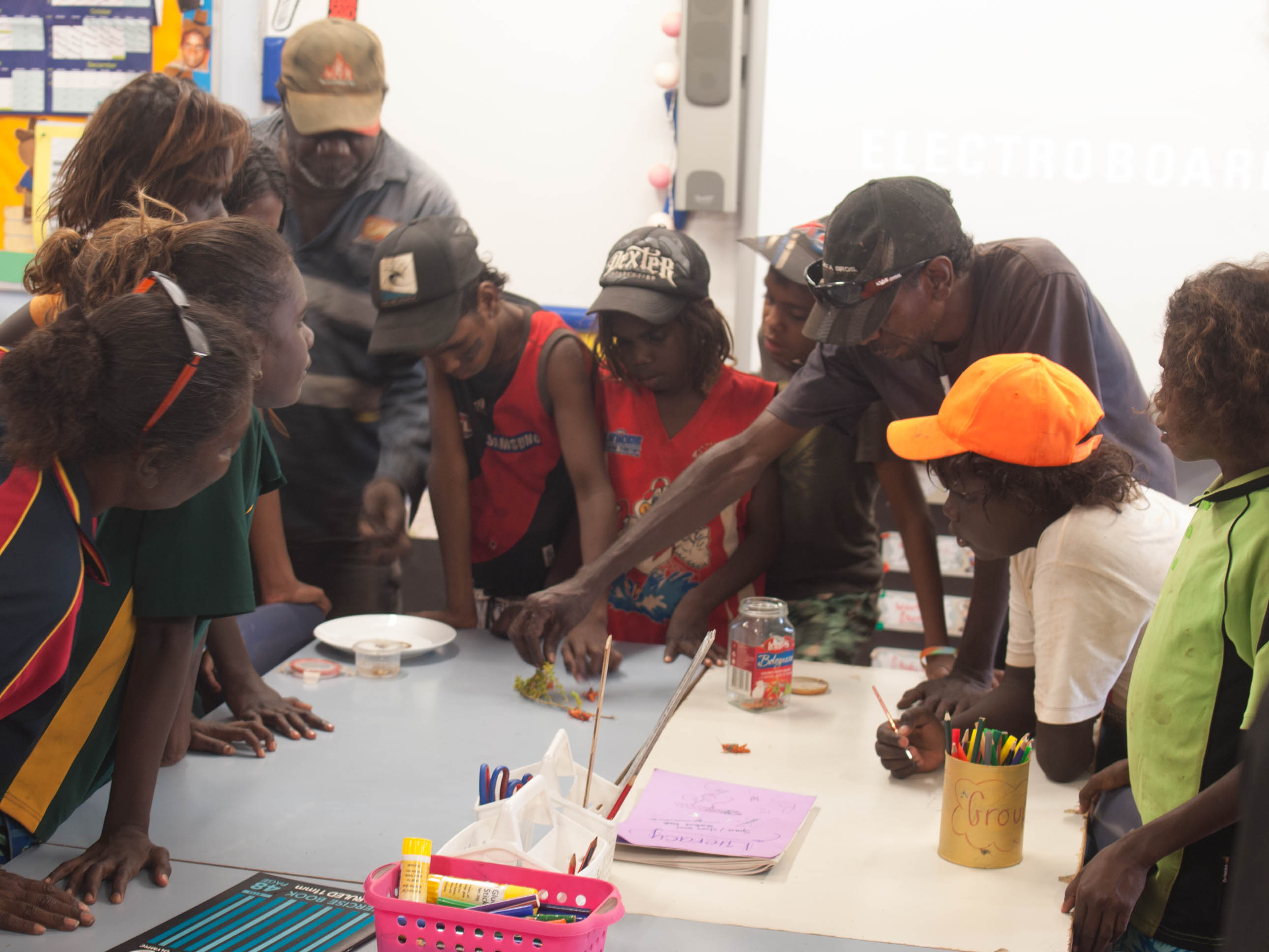 Leichhardt’s Grasshopper goes to school: Yugul Mangi Rangers Simon Ponto and Kelvin Rogers introducing students and teachers at Ngukurr School to Leichhardt’s Grasshopper