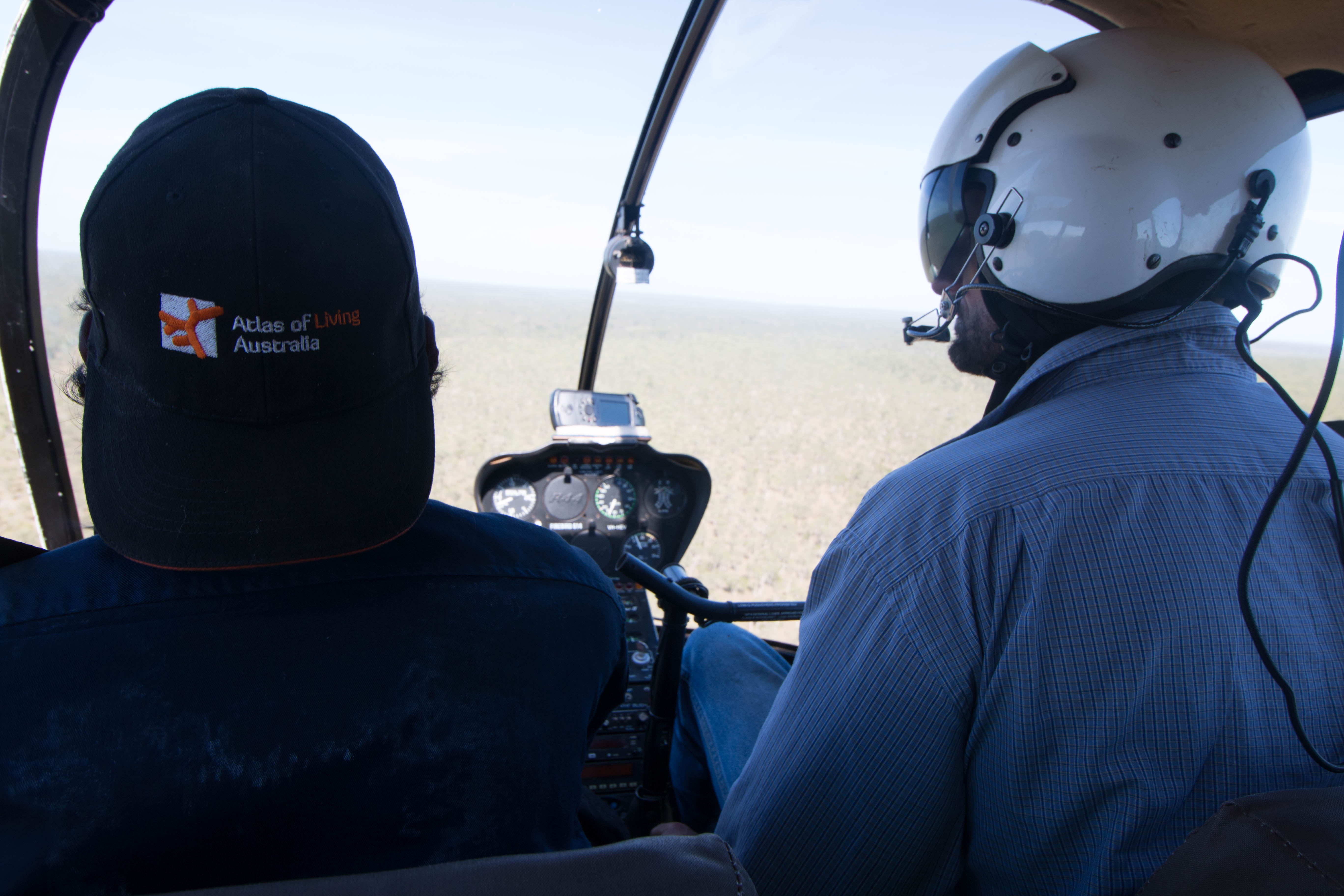 Kelvin Rogers (Jungayi and Yugul Mangi Ranger) travelling over Ngandi Country with North Australian Helicopters pilot Luke O’Donnell.