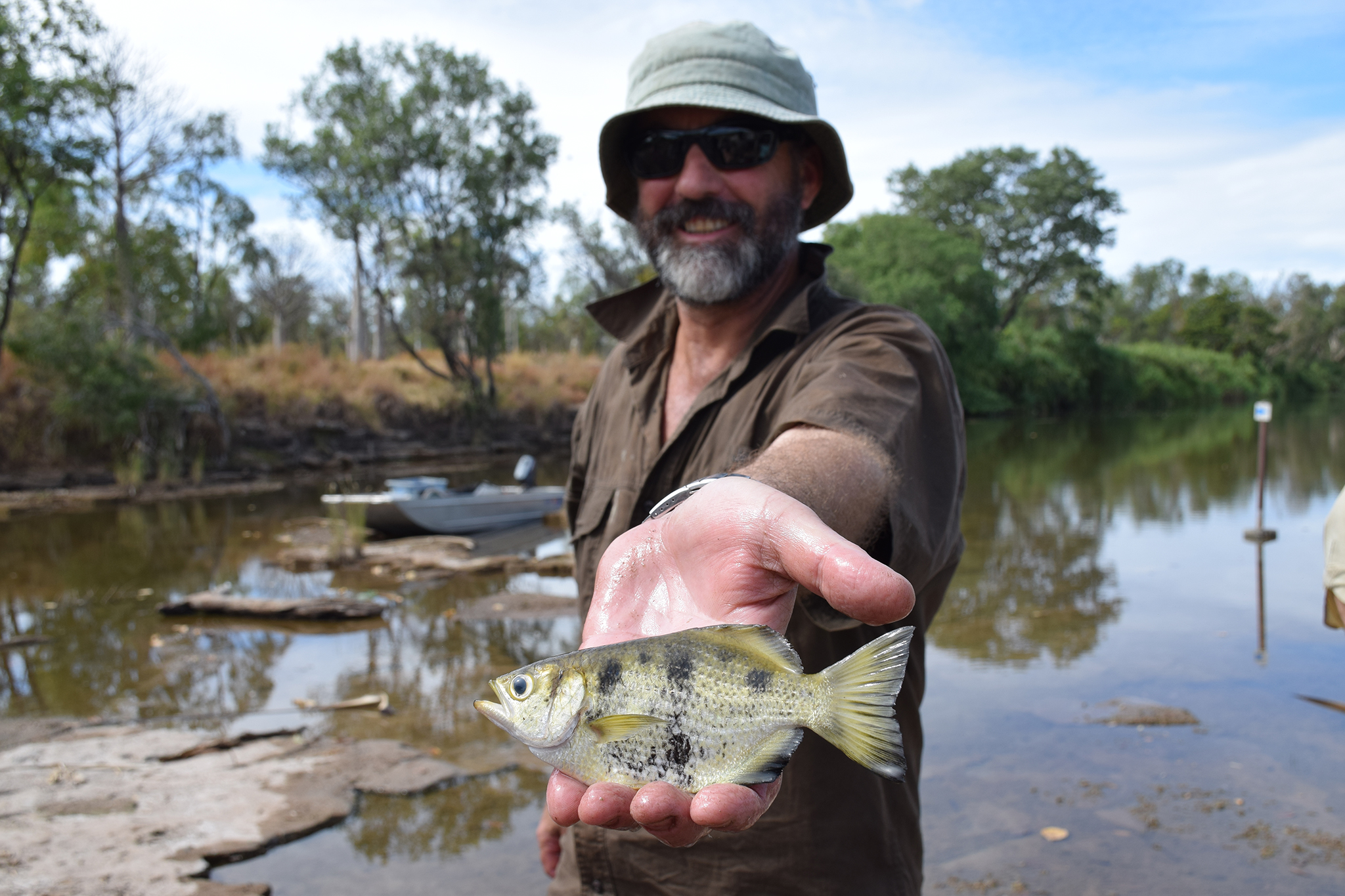 Gavin Dally holding an Archerfish
